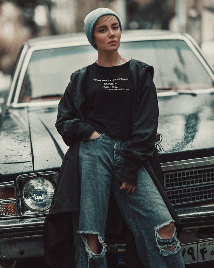 Woman Leaning On A Car