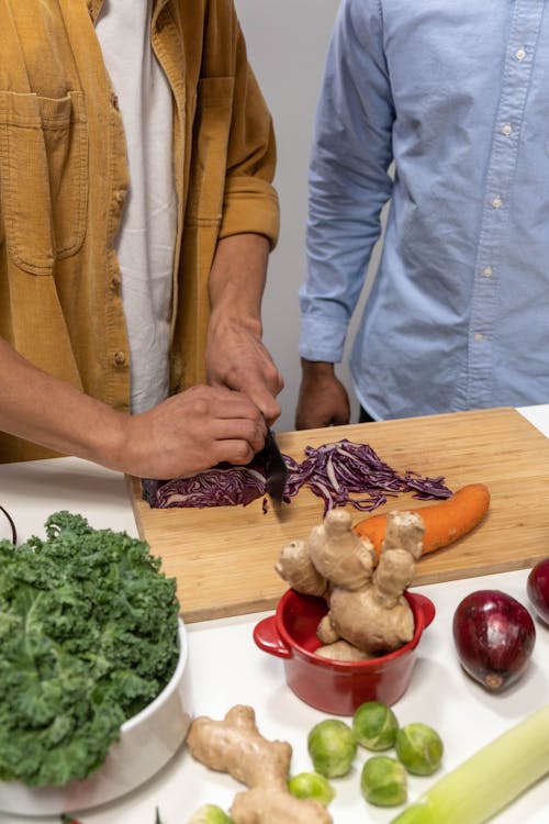 Free person Slicing Red Cabbage Stock Photo