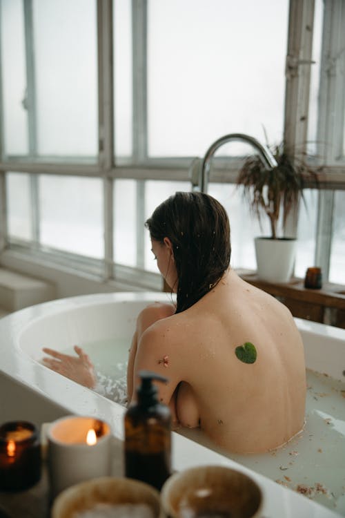 Free Naked Woman Sitting in Bathtub Stock Photo