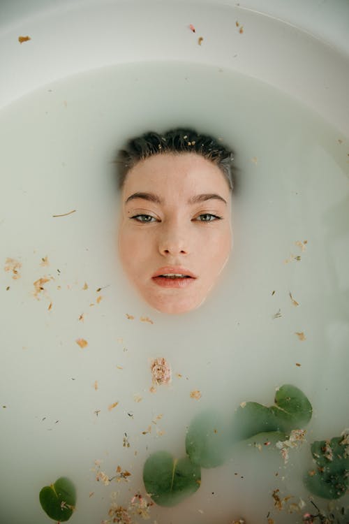 Woman submerged on a Bathtub 