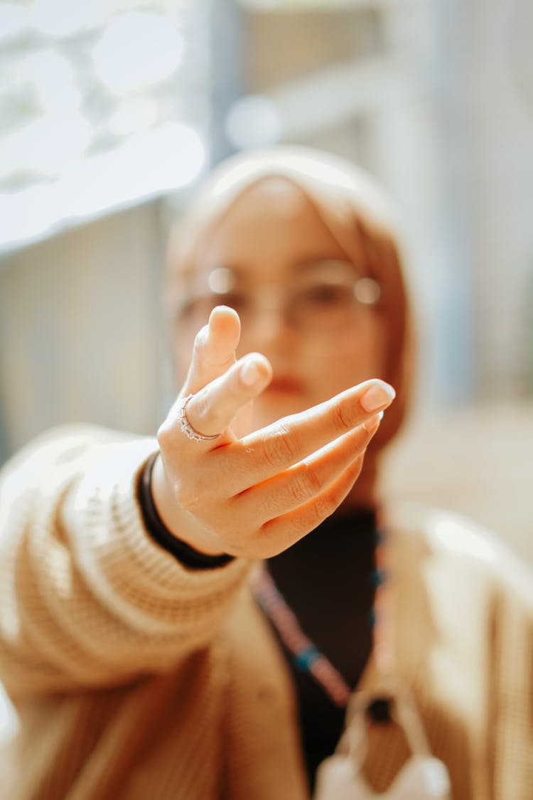 A Woman Extending Her Hand