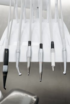 Close-up of modern dental tools in a clean clinic environment.