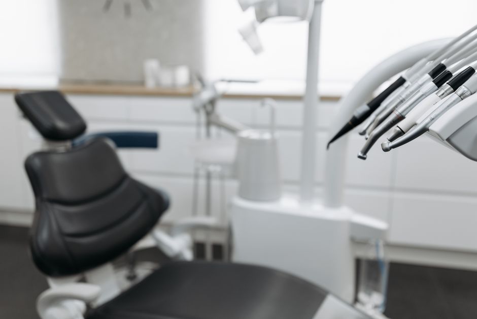 Modern orthodontic clinic interior with clean dental equipment Modern orthodontic clinic interior with clean dental equipment
