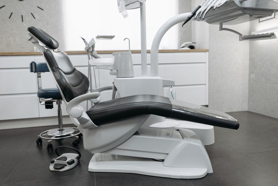 Contemporary dental clinic interior with dental chair and unit at Aurora Dental Studio in Bangsar