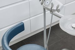 High-angle view of dental chair and equipment in a modern healthcare office.