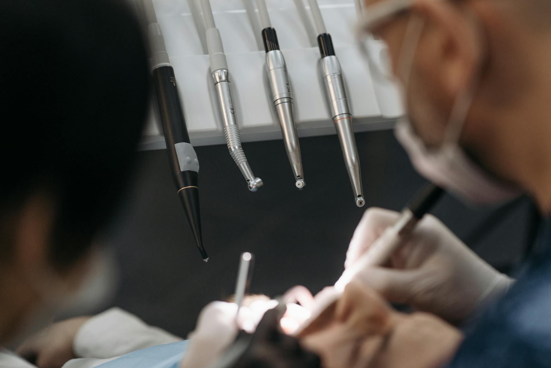 Dentist Using an Instrument