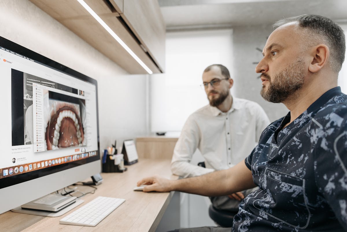 Dental tools and toothbrush representing oral hygiene and heart health connection