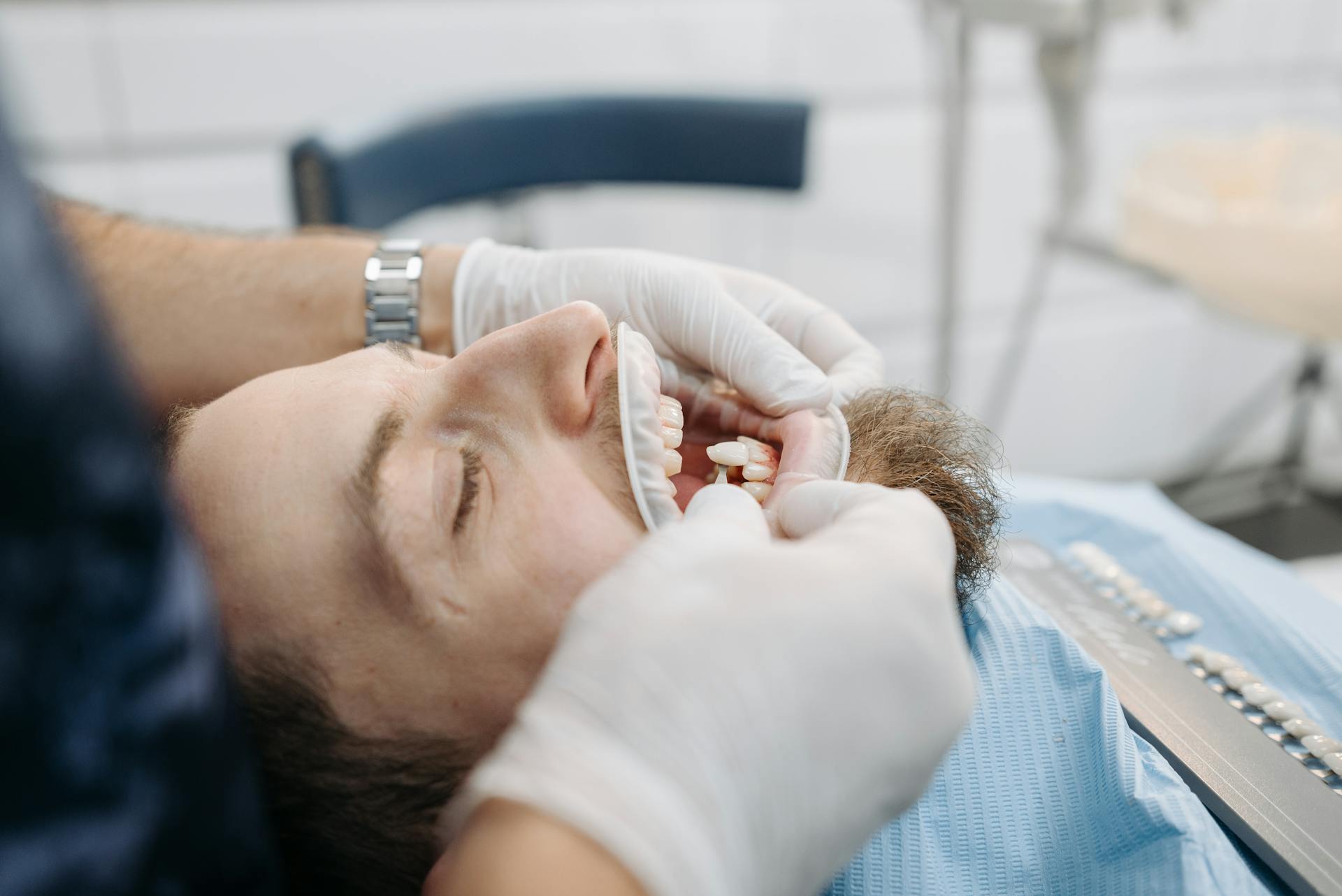 Man Opening his Mouth at the Dentists Office