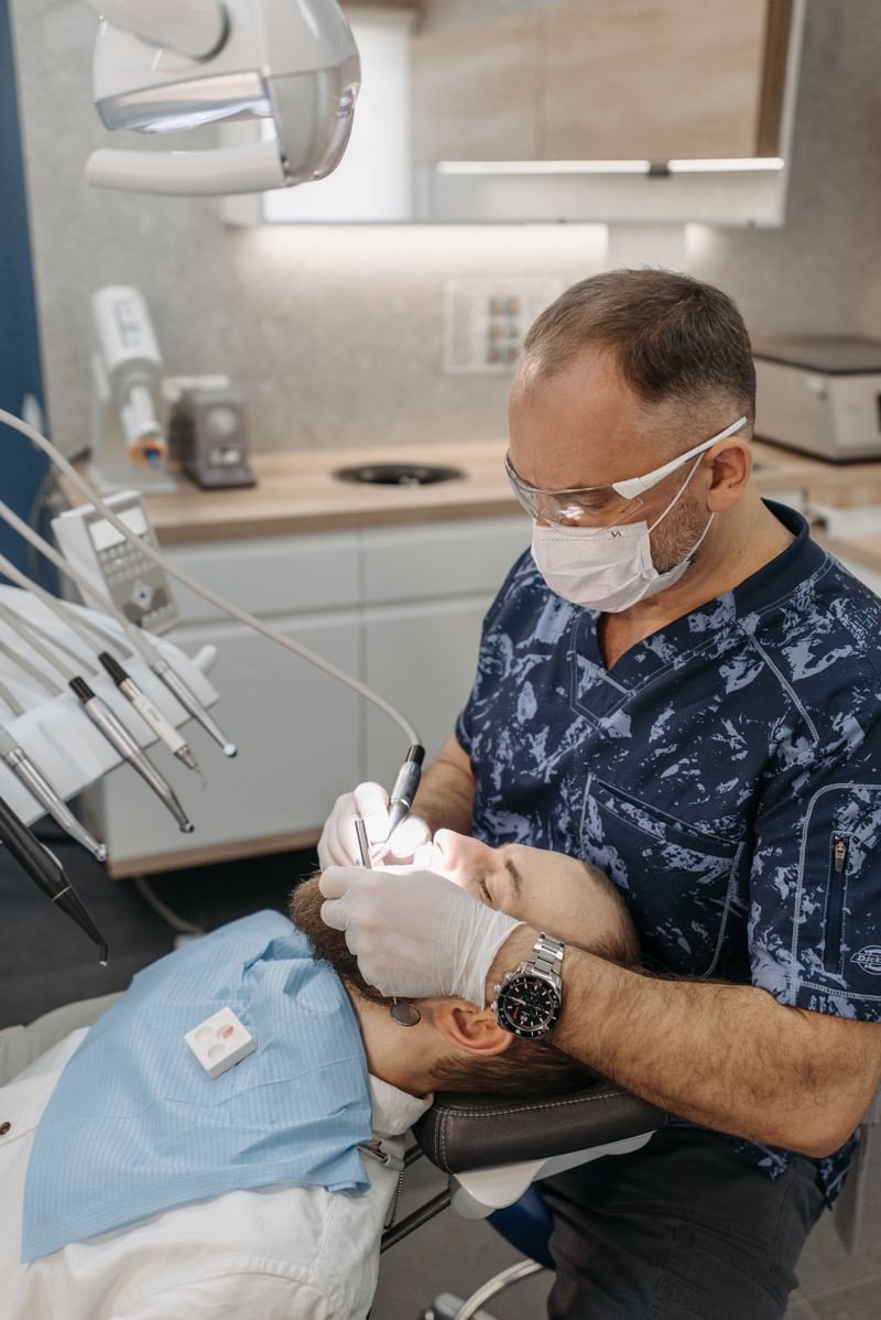 Dentist with patient