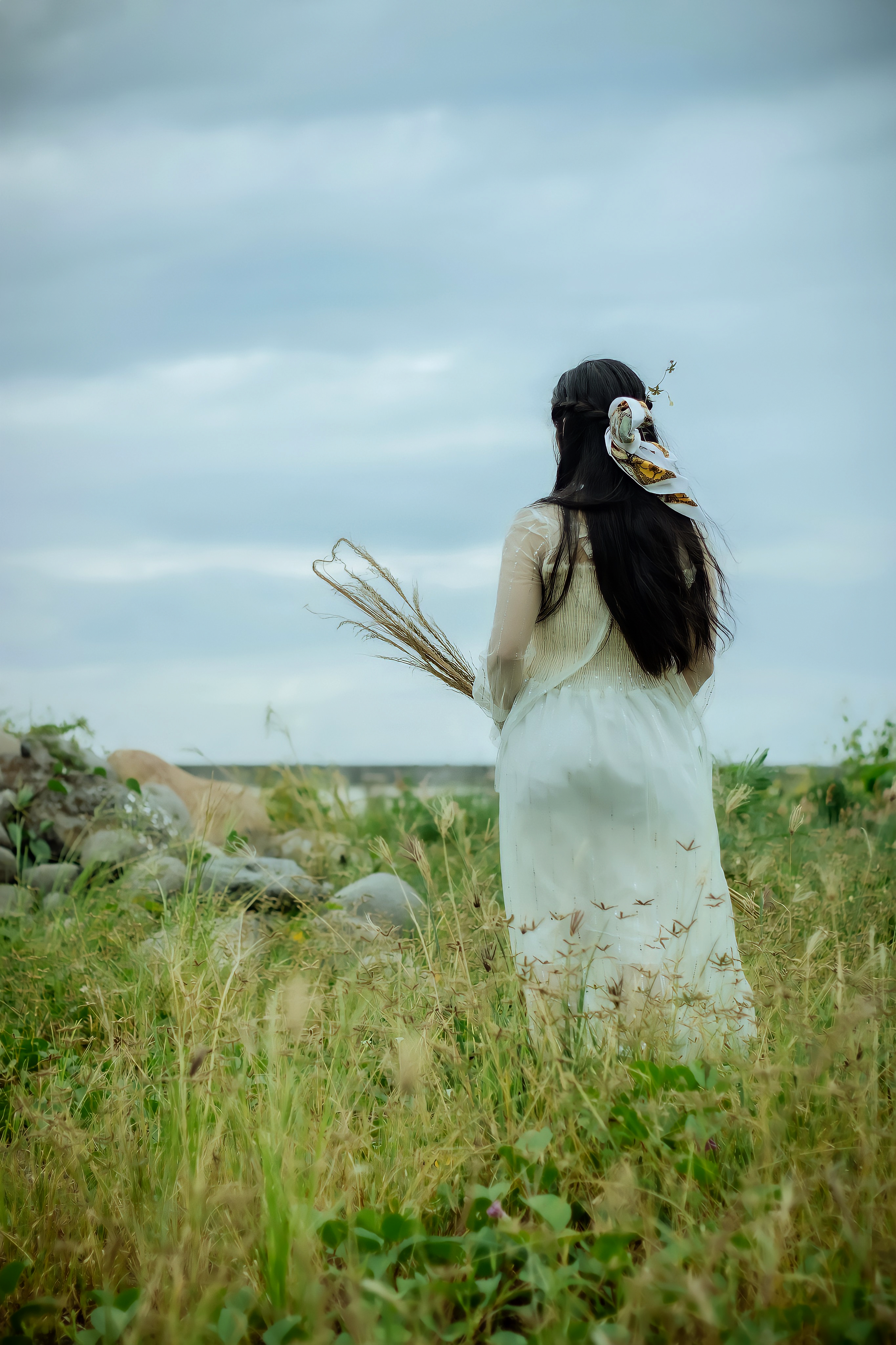 Woman Standing on Green Grass Field · Free Stock Photo
