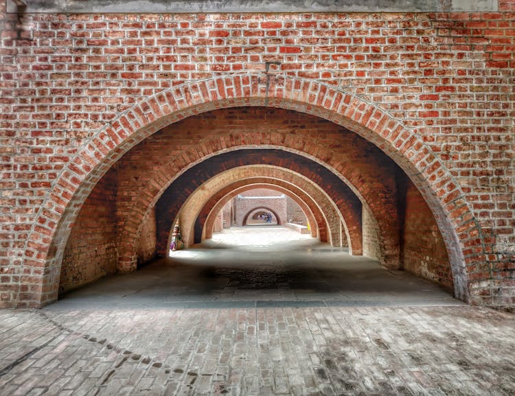 Arches Made Of Red Bricks In The Indian Institute Of Management