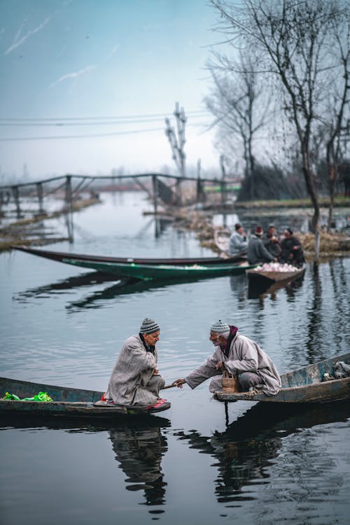 Men Sitting on Boat