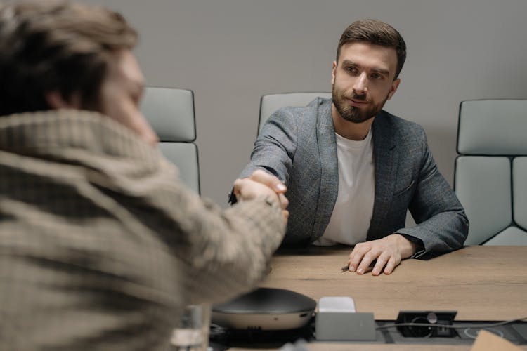 Men Shaking Hands At Work