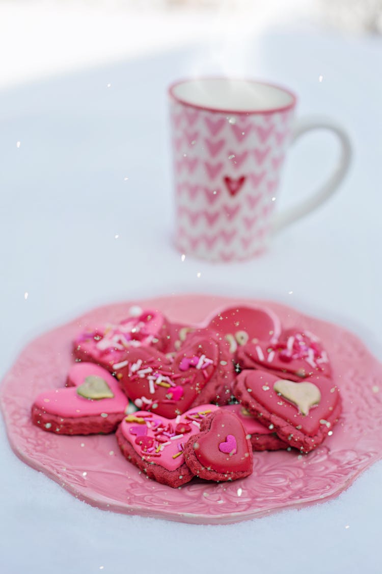 A Heart Shaped Cookies On Pink Plate