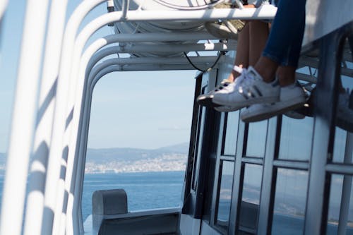 Free stock photo of boat, feet, hang over