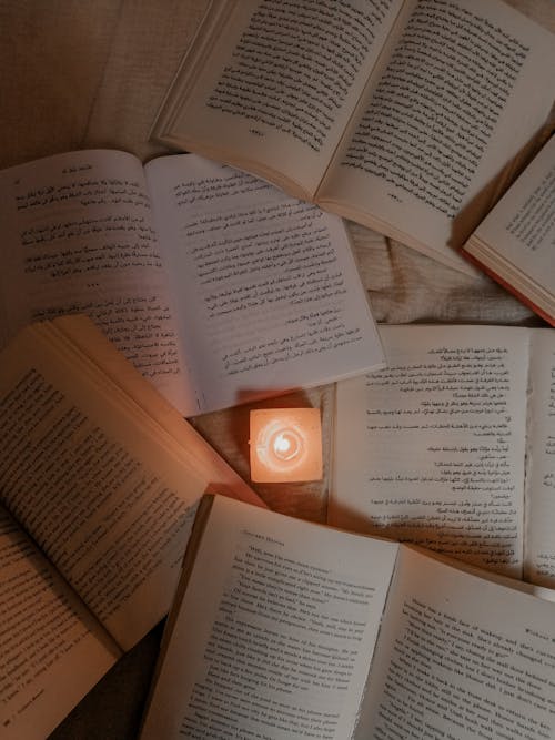 Candle near the Books