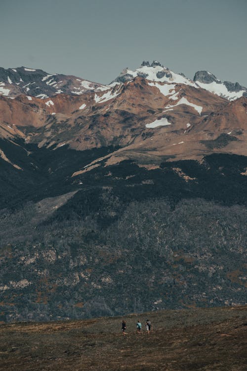 People Hiking a Mountain