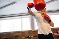 A Man Hitting the Heavy Bag