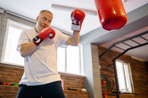 Free A Man Hitting the Heavy Bags Stock Photo