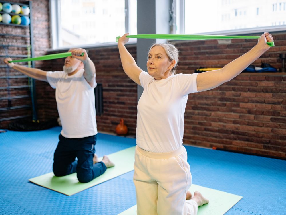 Elderly couple exercising