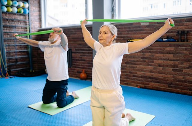 Elderly couple exercising