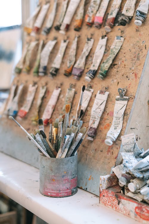 Old Plastic Tubes Hanging on a Clipboard