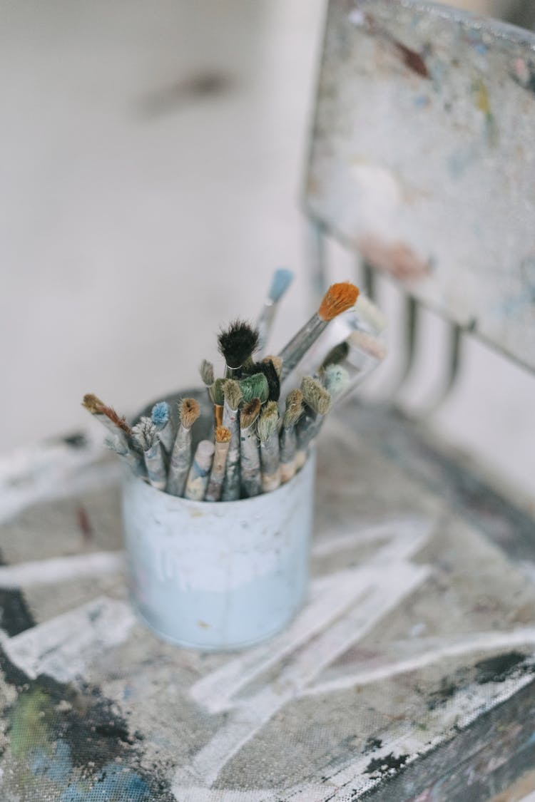 Paint Brushes In White Bucket