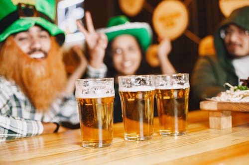 Free Clear Drinking Glass With Beer on Brown Wooden Table Stock Photo