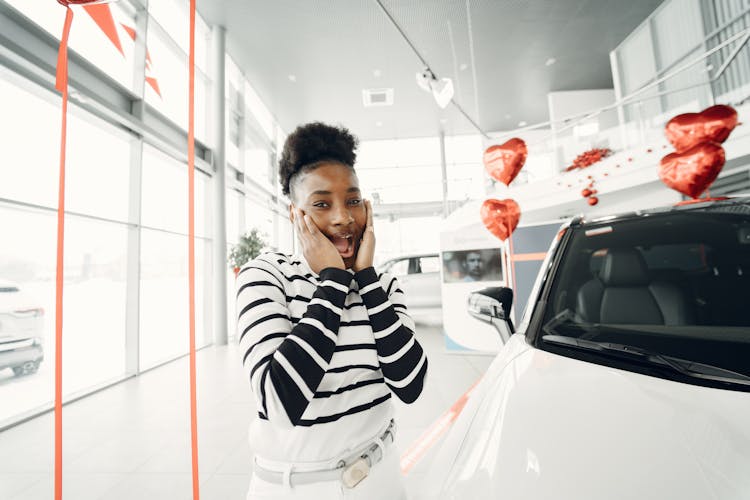 Woman With Gift Car