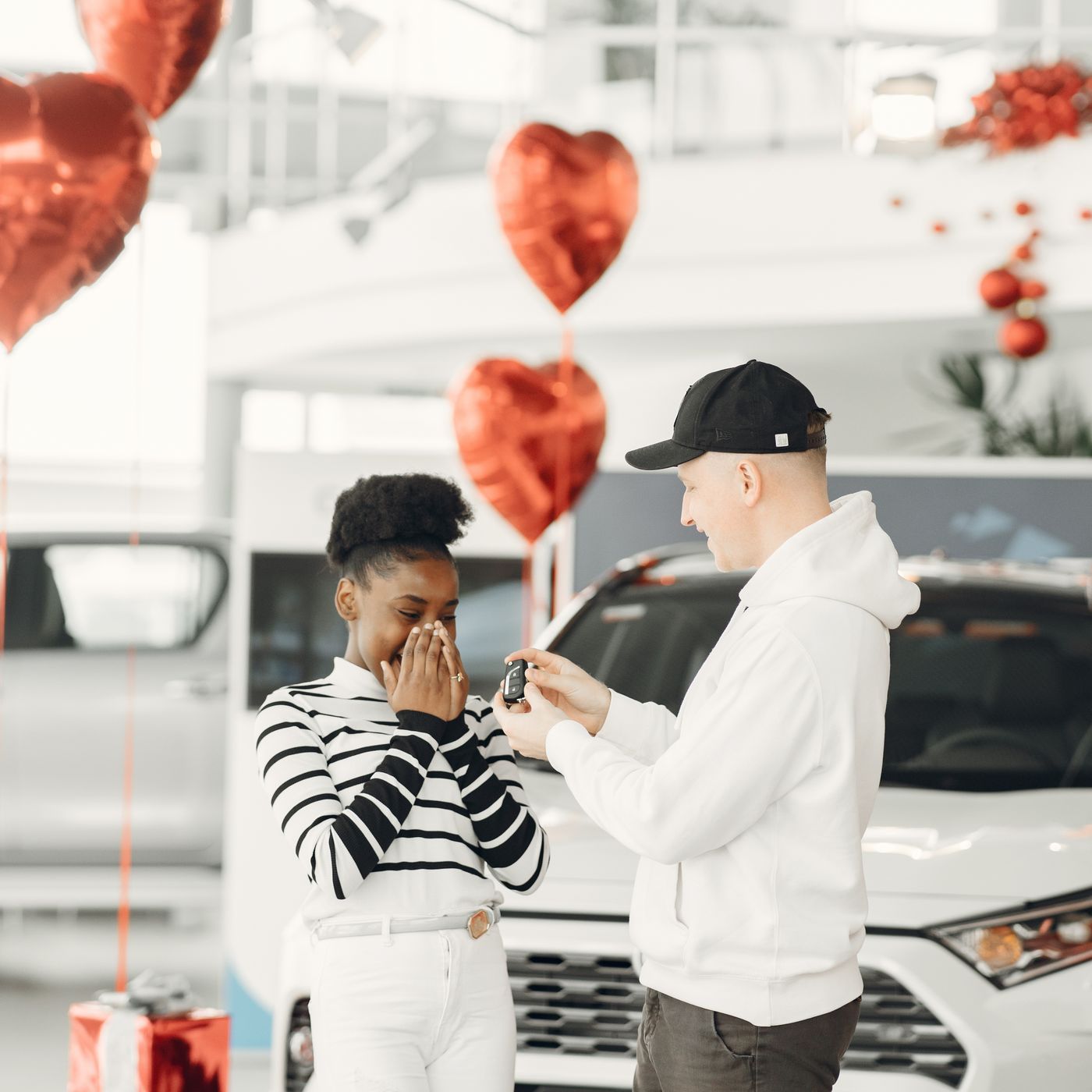 DriveVault team member handing over car keys to a customer