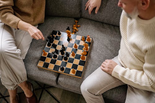 Photos gratuites de couple, échecs, échiquier