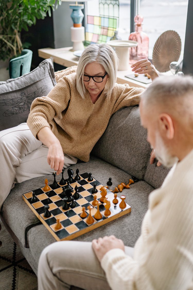 Elderly Couple Playing Chess