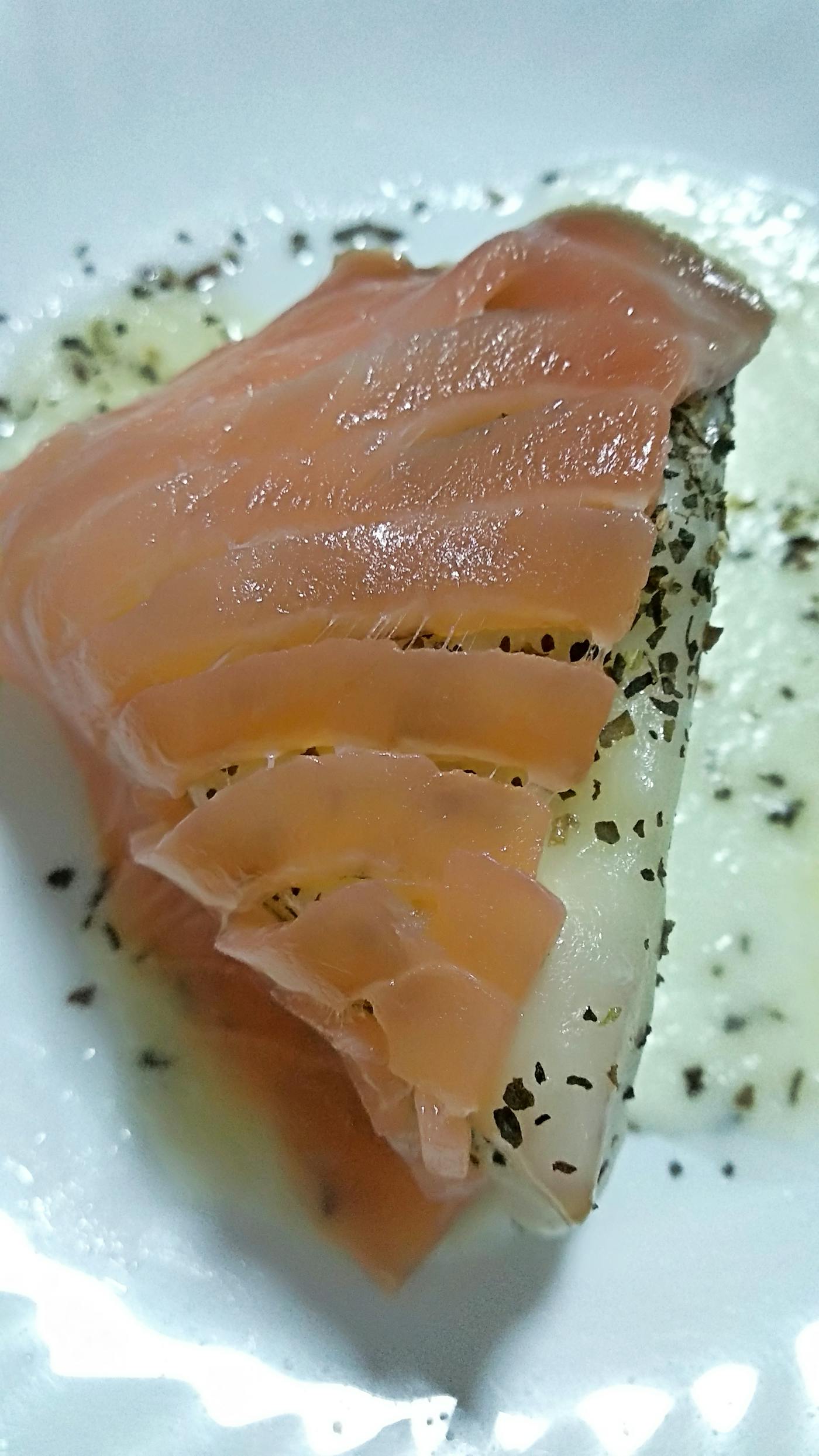 Parents with children waiting in a health clinic hallway