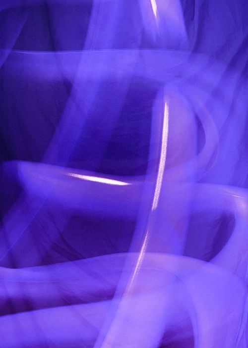 Free Vibrant abstract motion blur in purple shades, creating a dynamic pattern and ethereal feeling. Stock Photo