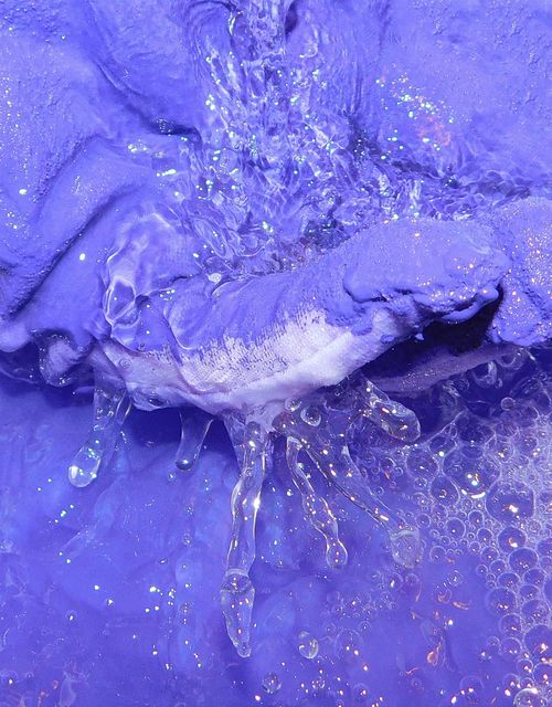 Free Dynamic close-up of purple liquid splashing, showcasing vivid colors and textures. Stock Photo