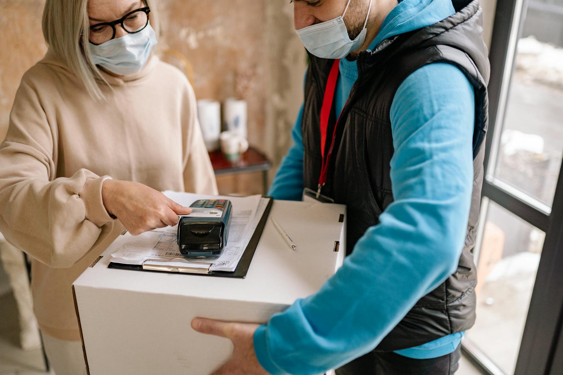 Woman Holding a Credit Card