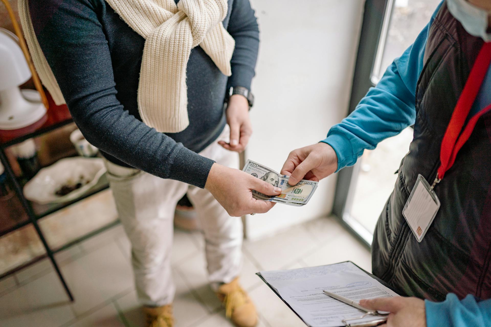 A Person Holding Money