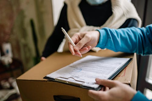 Person Signing a Document