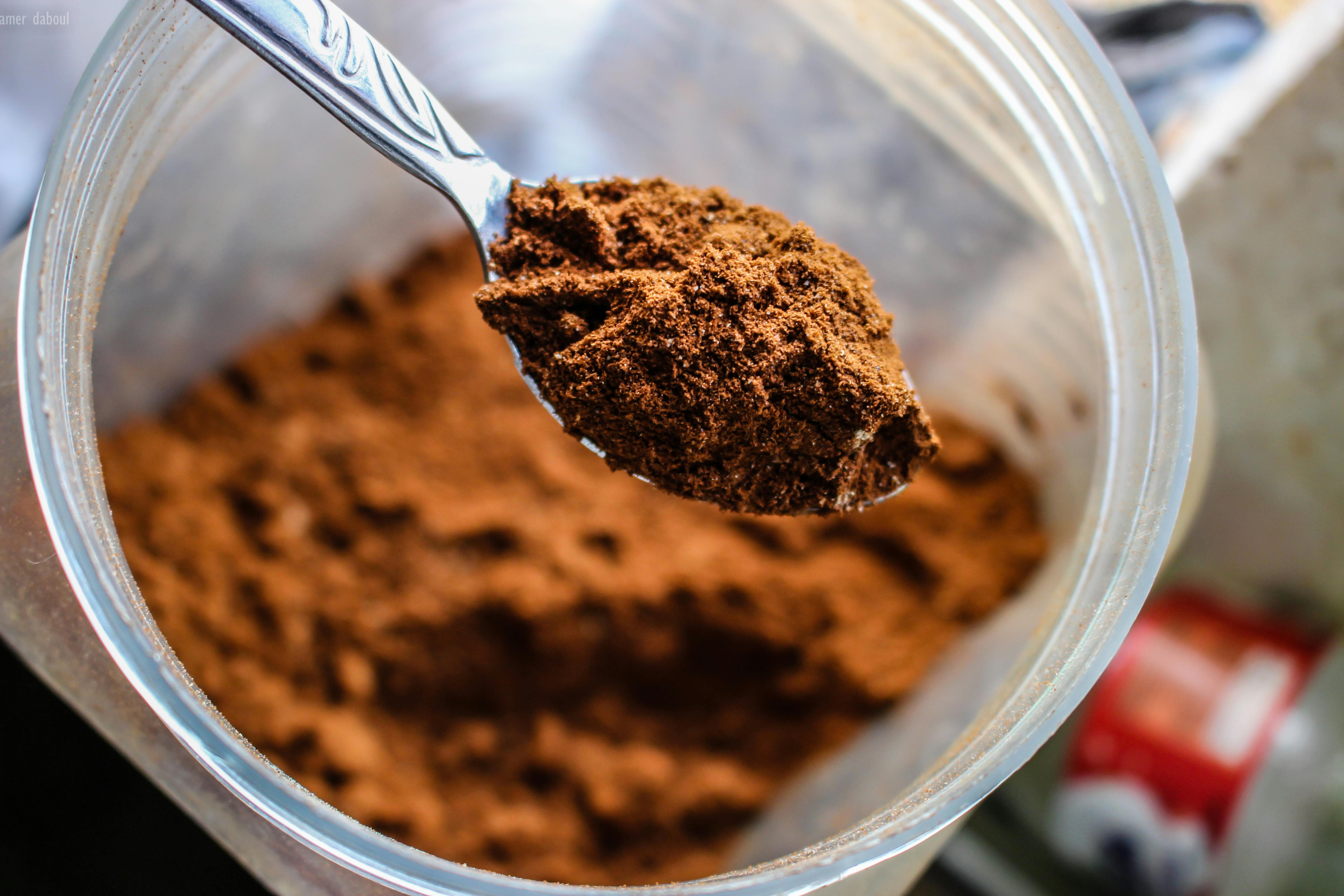 Powder on a spoon in a warm-toned close-up