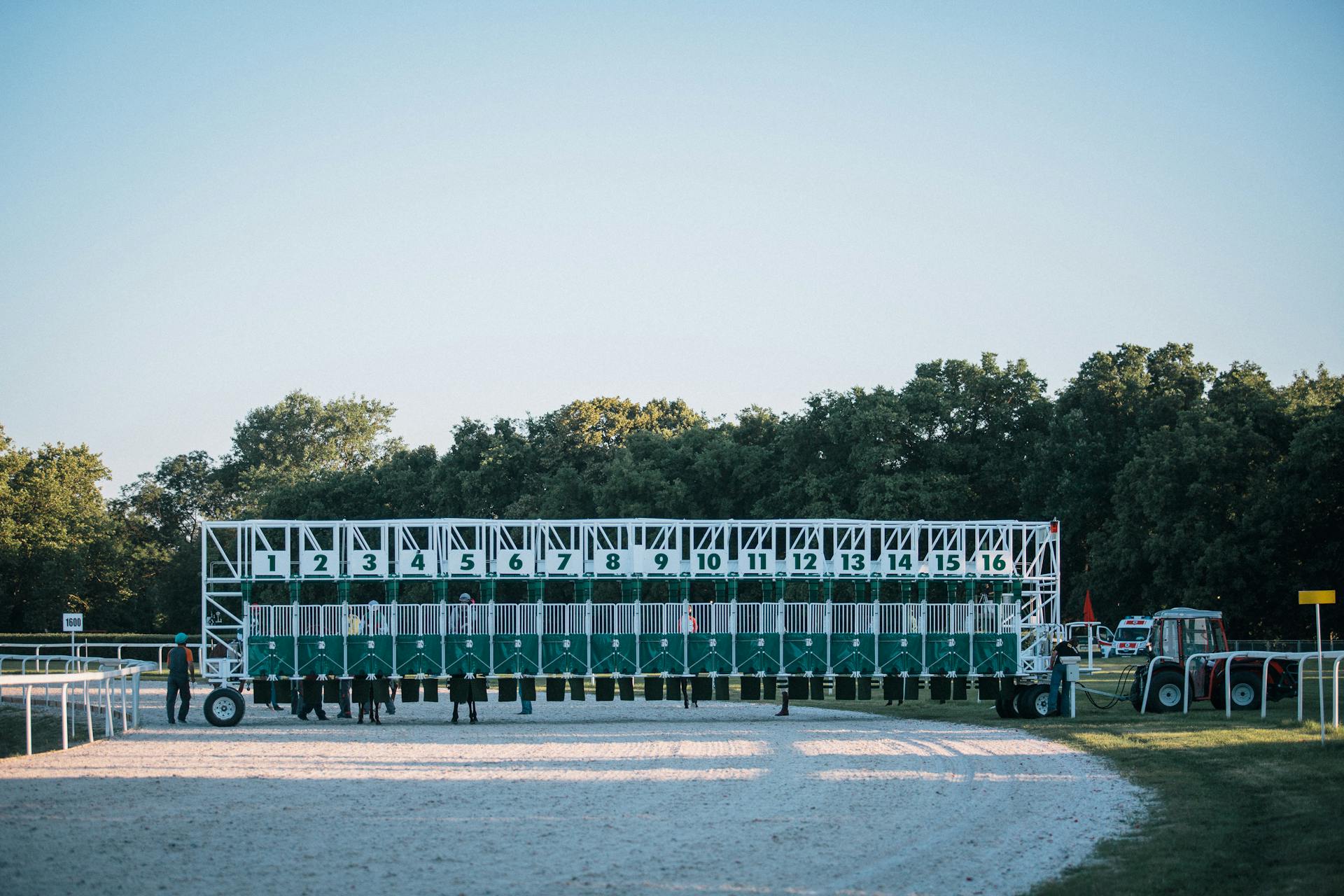 Starting gate at a horse racing track in Budapest, Hungary, ready for an exciting race day.