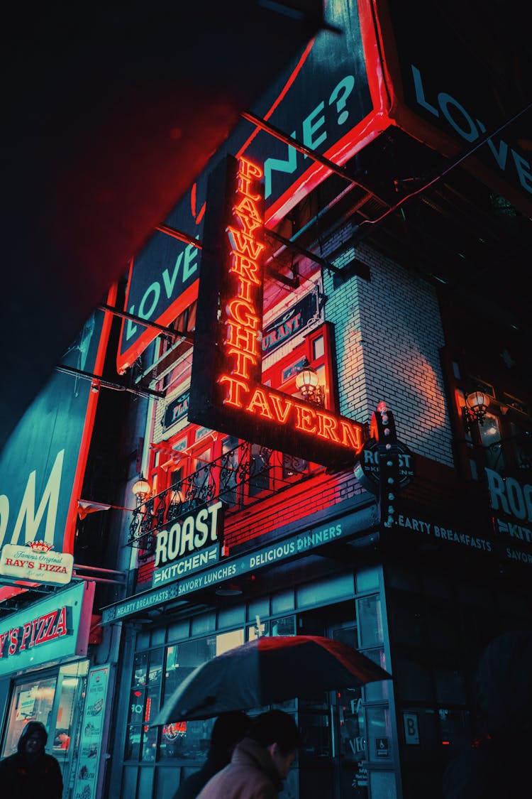 Signboard With Inscription On Building In Night City