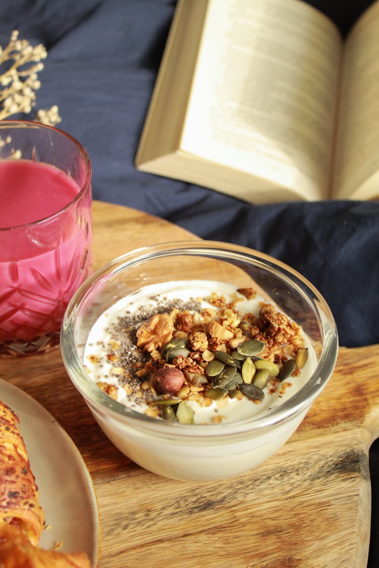 Clear Glass Bowl With Yogurt And Nuts 