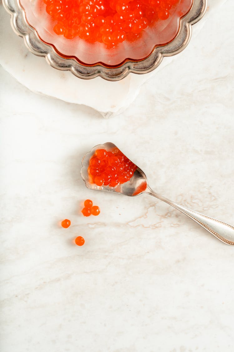 Red Caviar On A Spoon 