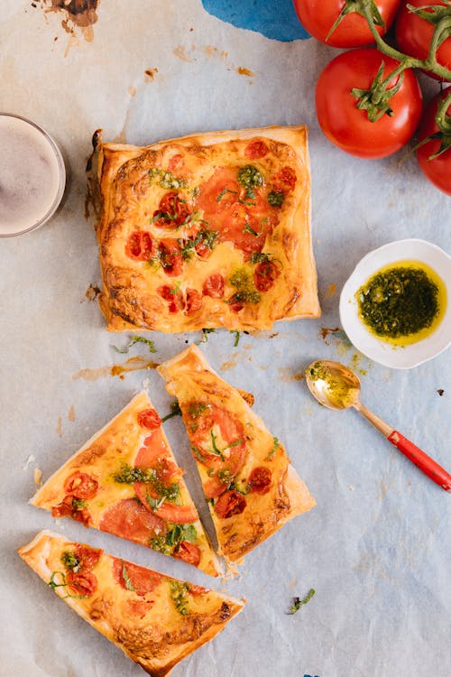 Free Brown and Red Pizza on White Table Stock Photo