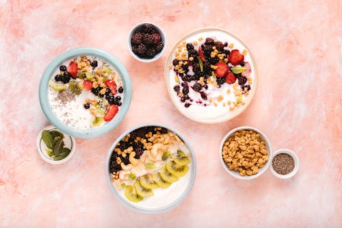 Free Mixed Fruits and Nuts in Ceramic Bowls Stock Photo