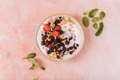 Free Breakfast Smoothie Bowl with Fruit and Nuts  Stock Photo