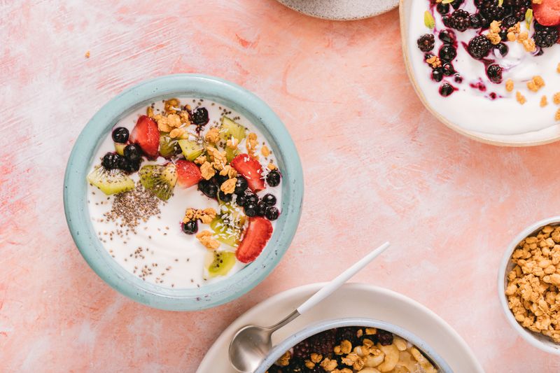 frozen yogurt bark with berries broken into pieces