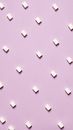 White Square Blocks on Pink Surface