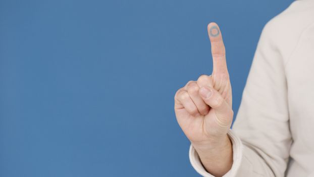 Person in White Long Sleeve Shirt Showing Right Hand