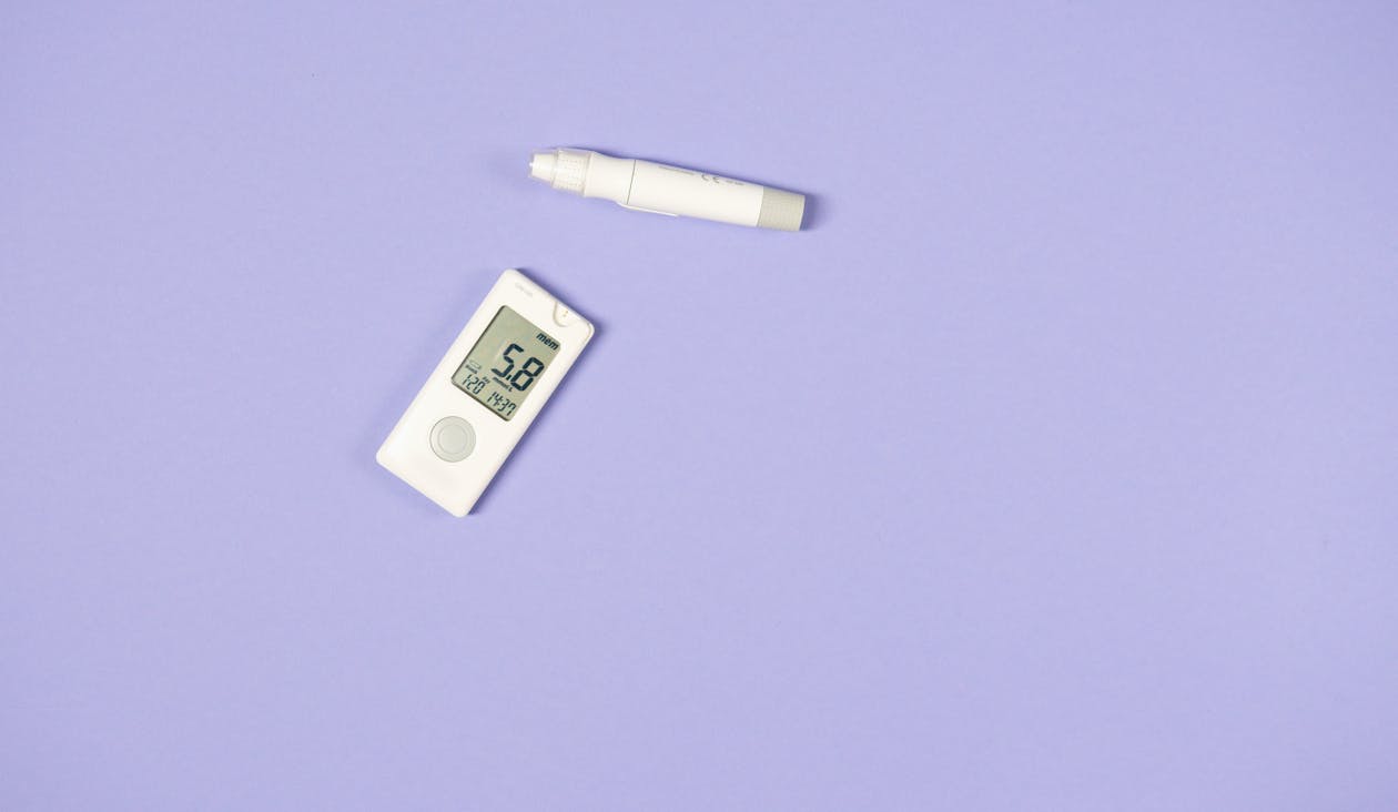 A Glucometer and a Lancet Pen